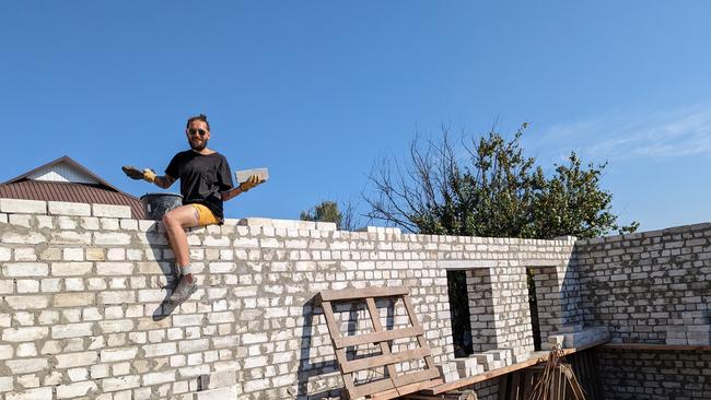 Jeremy Pryslak building houses in Lukashivka, Ukraine. Picture: Supplied