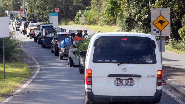 There was a long line of cars at the entrance of Molendinar Waste and Recycling Centre today ahead of Council's decision to start charging fees for entry. 19 June 2022 Molendinar Picture by Richard Gosling