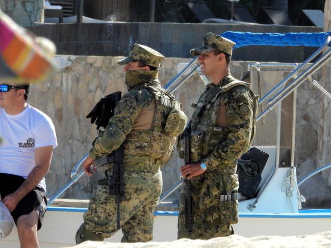 Mexican marines patrol the beach at the exclusive One &amp; Only Resort in Pamilla, Mexico, ahead of the celeb wedding. Picture: News Corp Australia