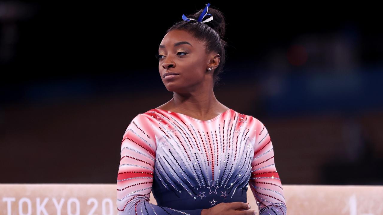 Simone Biles left in the middle of the Olympics. Photo by Laurence Griffiths/Getty Images.