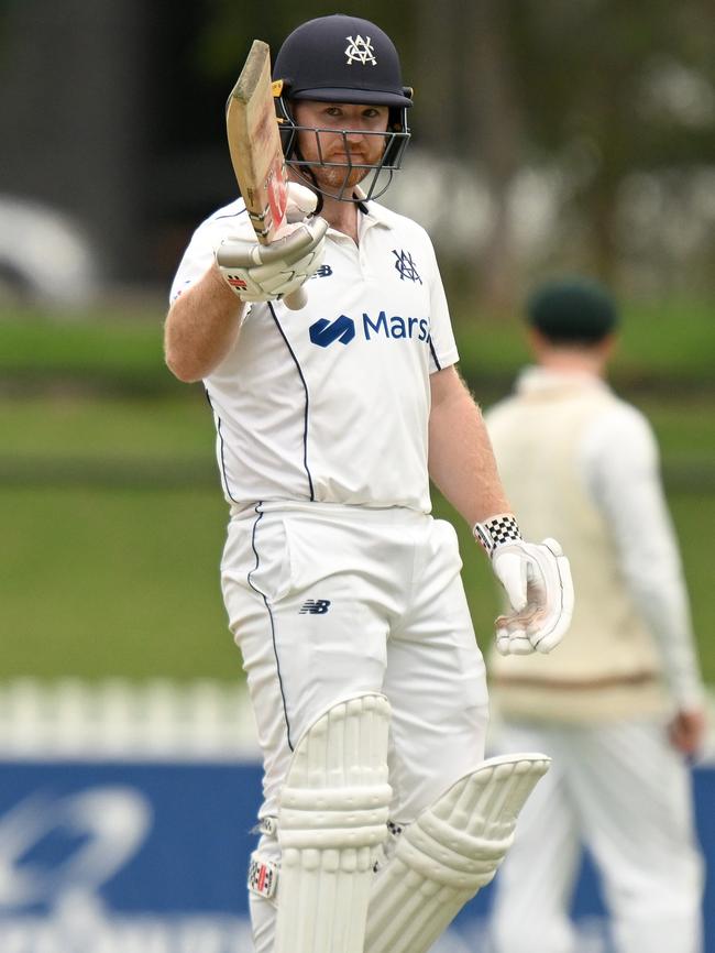 Travis Dean celebrates a century for Victoria in 2022.