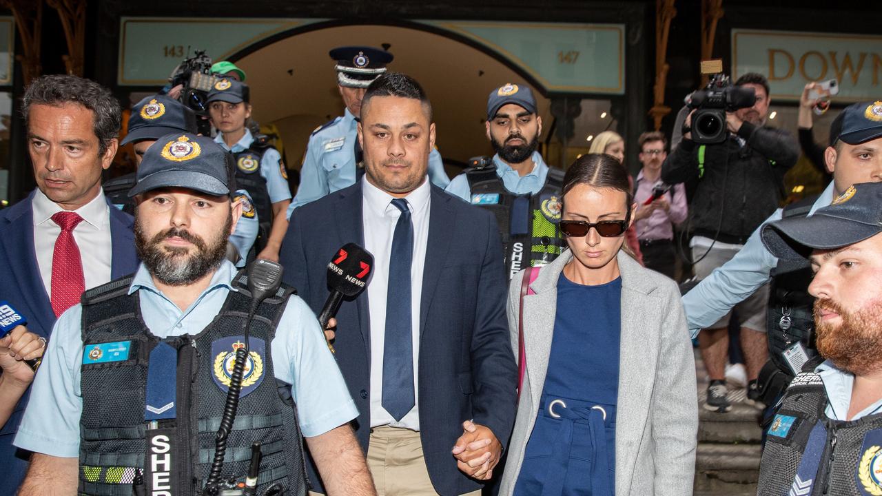 Jarryd Hayne (C) leaves the Downing Centre holding his wife's hand Amellia Bonnici in Sydney. Picture: NCA Newswire / Christian Gilles