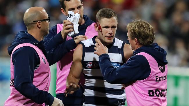 Joel Selwood gets cleaned up after receiving a cut to his head in 2017. Picture: Michael Klein