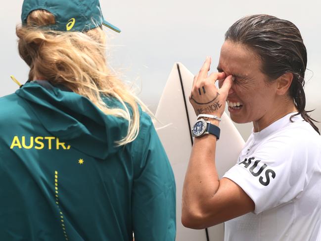 Sally Fitzgibbons couldn’t contain her heartbreak after crashing out of the surfing. Picture: Getty Images