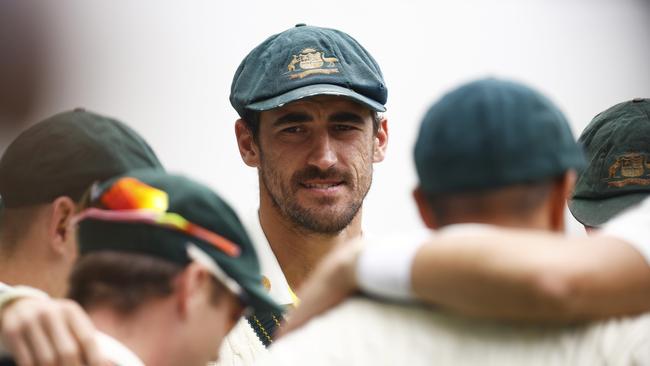 MELBOURNE, AUSTRALIA - DECEMBER 29: Mitchell Starc of Australia looks on in the team huddle during day four of the Second Test match in the series between Australia and South Africa at Melbourne Cricket Ground on December 29, 2022 in Melbourne, Australia. (Photo by Daniel Pockett/Getty Images)