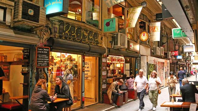 Seek a magic in one of the city’s atmospheric laneways. Photo: Scott Barbour/Getty Images