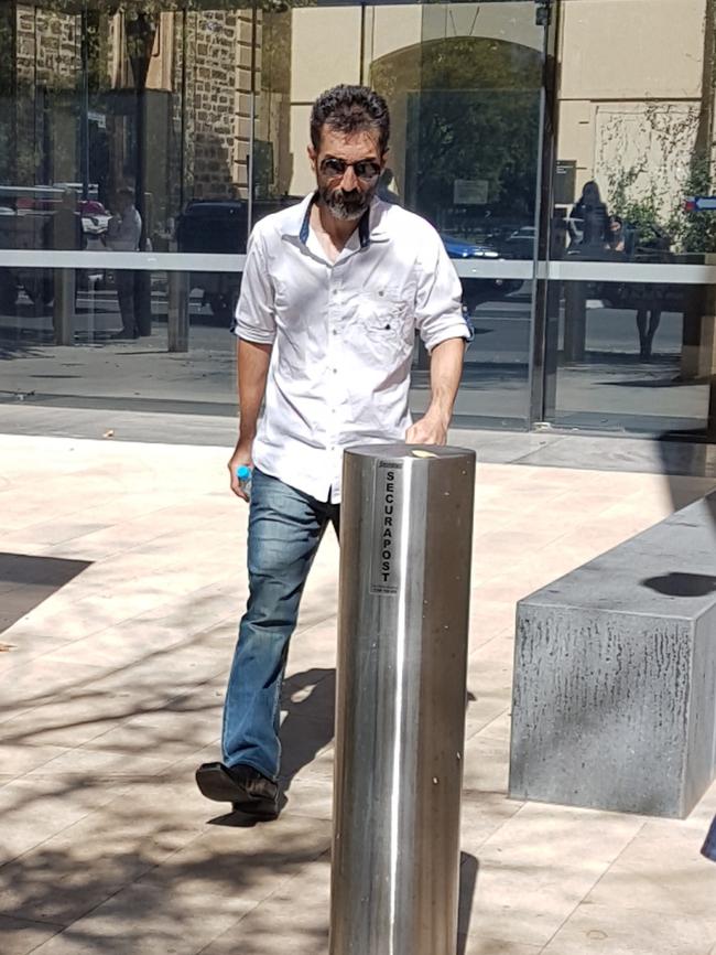 Payam Saadat leaves the Supreme Court. Mr Saadat is suing the Commonwealth Government for negligence over his detention in centres at Curtin and Baxter. Picture: The Advertiser