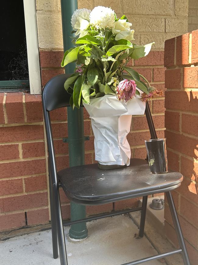 Flowers left outside Eddie's home in Hectorville on Friday morning. Picture: Zayda Dollie