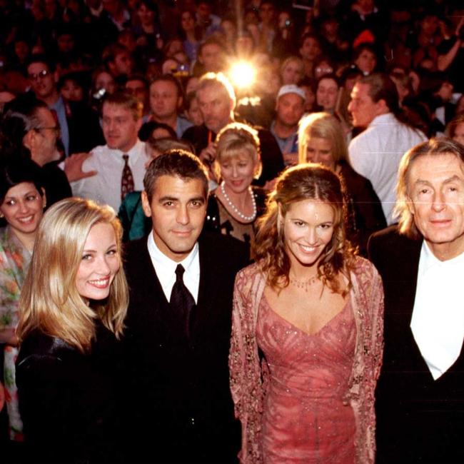 George Clooney, Elle MacPherson, director Joel Shumacher