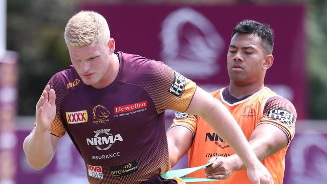 Thomas Flegler (left). The Brisbane Broncos training at Red Hill. Pic Peter Wallis