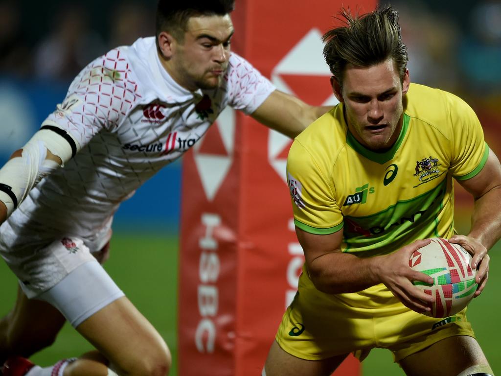 DUBAI, UNITED ARAB EMIRATES - DECEMBER 01: Lachlan Anderson of Australia scores a try during the HSBC World Rugby Sevens Series 2019 Bronze Final match between England and Australia on Day Three of the Emirates Airline Dubai Sevens, the first leg of the HSBC Sevens World Series at The Sevens Stadium on December 01, 2018 in Dubai, United Arab Emirates.  (Photo by Tom Dulat/Getty Images)