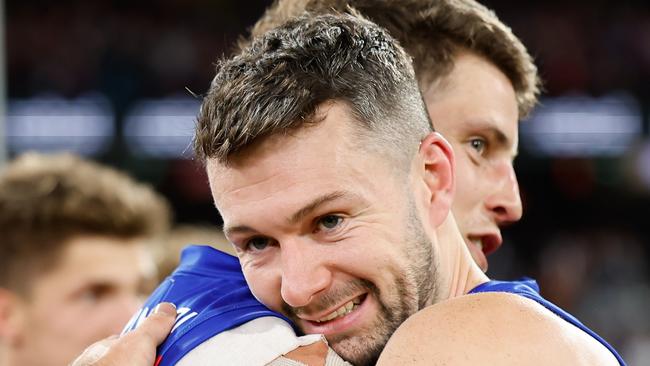 MELBOURNE, AUSTRALIA - SEPTEMBER 21: Conor McKenna of the Lions and Jarrod Berry of the Lions celebrate during the 2024 AFL Second Preliminary Final match between the Geelong Cats and the Brisbane Lions at The Melbourne Cricket Ground on September 21, 2024 in Melbourne, Australia. (Photo by Dylan Burns/AFL Photos via Getty Images)