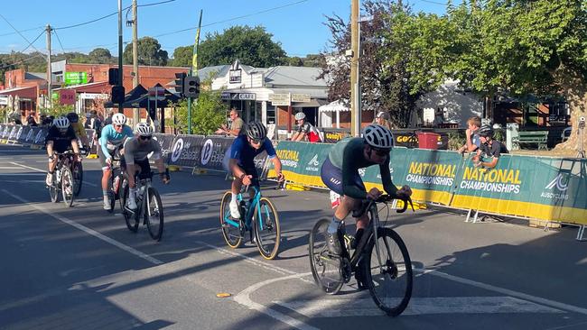 A bunch of riders cross the start finish line in the Gran Fondo. Picture: Shane Jones.