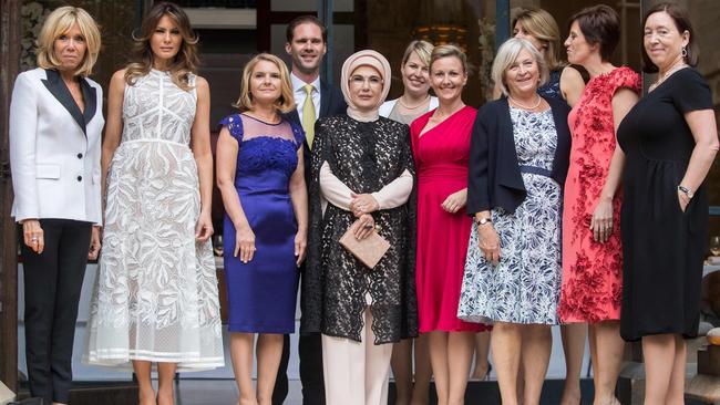 France’s Brigitte Macron; Melania Trump;  Donald Tusk’s wife Malgorzata; Gauthier Destenay, husband of Luxembourg Prime Minister Xavier Bettel; Turkey’s first lady Emine Gulbaran Erdogan; Estonian Prime Minister Juri Ratas’s wife Karin; Slovenian Prime Minister Miro Cerar’s partner Mojca Stropnik;  Swedish Prime Minister Stefan Lofven’s wife, Ulla; Bulgarian President Rumen Radev’s wife Desislava Radeva; Belgian Prime Minister Michel’s partner Amelie Derbaudrenghien and NATO secretary-general Jens Stoltenberg’s wife Ingrid Schulerud at the Queen ­Elisabeth Music Chapel outside Brussels. Picture: AFP