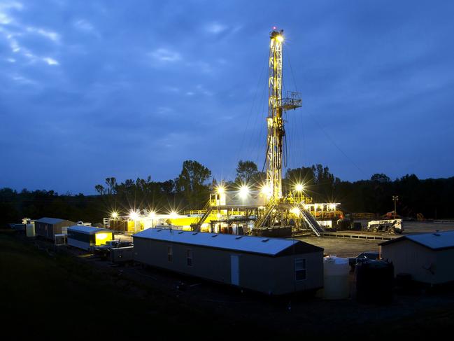 This undated handout photo received on January 15, 2016 shows a BHP oil and shale gas rig in Fayetteville, Arkansas. Australian mining giant BHP Billiton said it expects to book a USD 7.2 billion pre-tax writedown against the value of its struggling onshore assets in the United States as tumbling oil prices hit shale gas. AFP PHOTO / BHP ----EDITORS NOTE ----RESTRICTED TO EDITORIAL USE MANDATORY CREDIT "AFP PHOTO / BHP" NO MARKETING NO ADVERTISING CAMPAIGNS - DISTRIBUTED AS A SERVICE TO CLIENTS - NO ARCHIVES