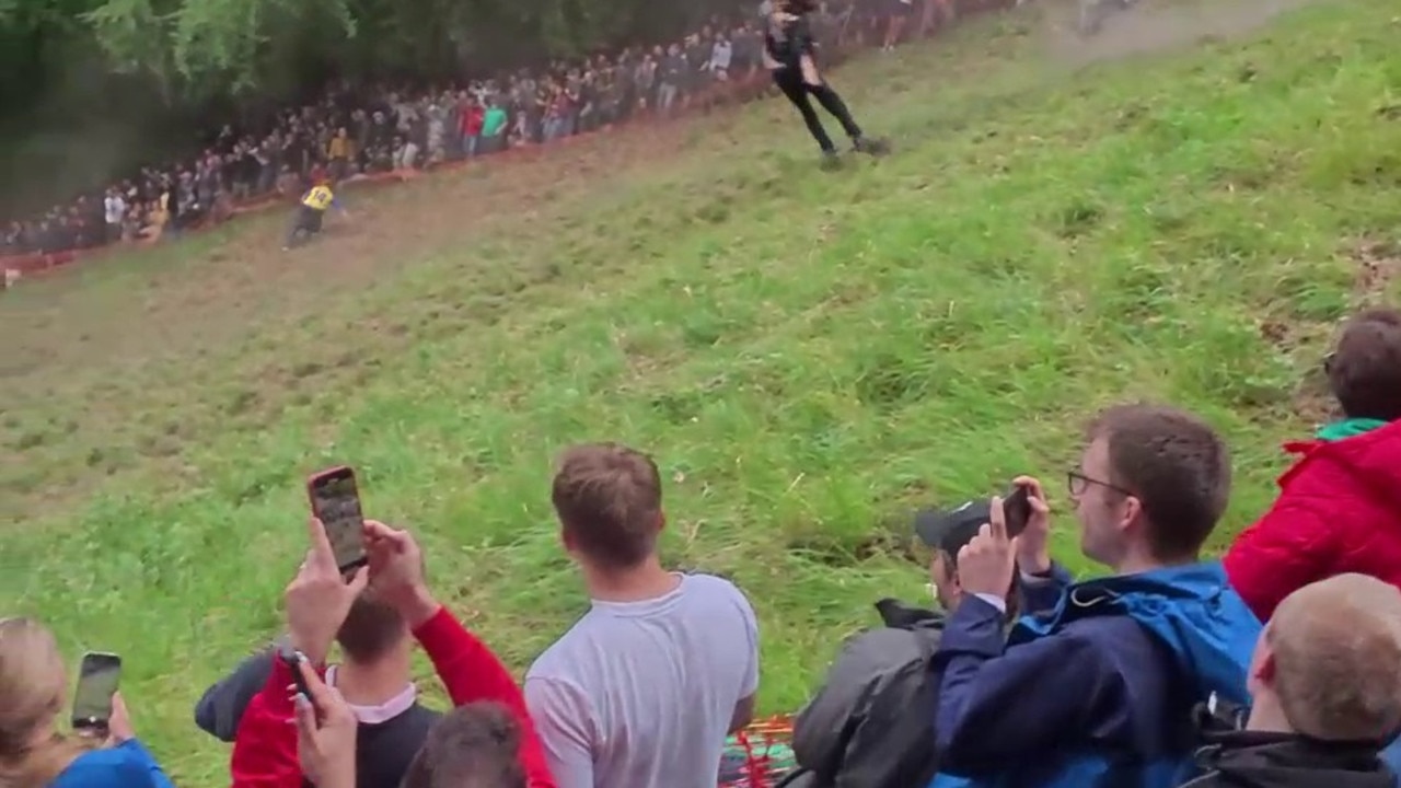 The man ended up backwards as he sprinted down the steep hill. Picture: Alex West/The Sun