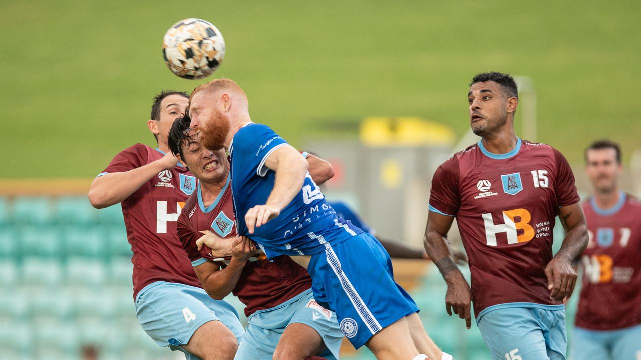 Ziggy Gordon winning a header for Sydney Olympic. Picture: Julian Andrews