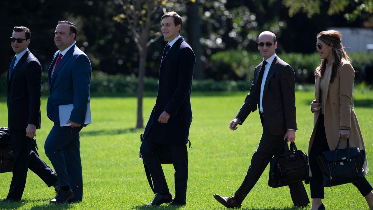 And here Ms Hicks is yesterday, heading to Marine One with a group of aides including the President’s son-in-law Jared Kushner. Picture: Andrew Caballero-Reynolds/AFP
