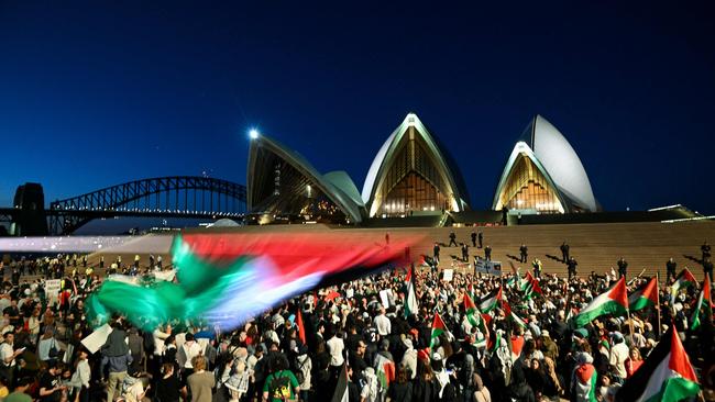 Protesters march on the Opera House. Picture: Izhar Khan/AFP