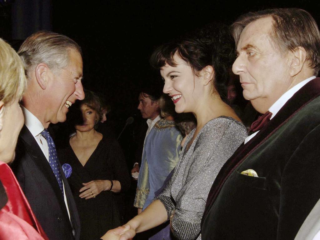 Barry Humphries waits his turn to meet Prince Charles at the John Betjeman Centenary Gala in 2006.