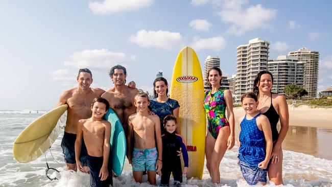 Former NRL star Billy Slater and International polo star Nacho Figueras go for a group surf on the Gold Coast ahead of the Magic Millions. L to R: Billy Slater with son Jake, 9, Nacho Figueras with kids Artemio, 10, Aurura, 15, Alba, 6, and wife Delfina Blaquier, and Nicole Slater with daughter Tyla, 11. Pic: Luke Marsden