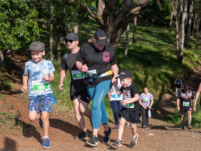 Crossing the finish line together the family complete the 5km hike, Lucas Maloney, Jayden Maloney, Courtney Bishop and Lily Maloney.Hike for Homeless held at Jubilee Park. October 19th, 2024