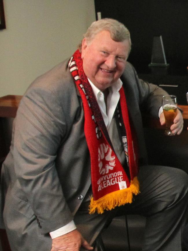 Adelaide United part owner Robert Gerard toasts the Reds.