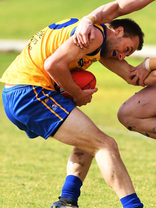 Gaza’s Damon Hill shrugs a tackle. Picture: AAP/Mark Brake