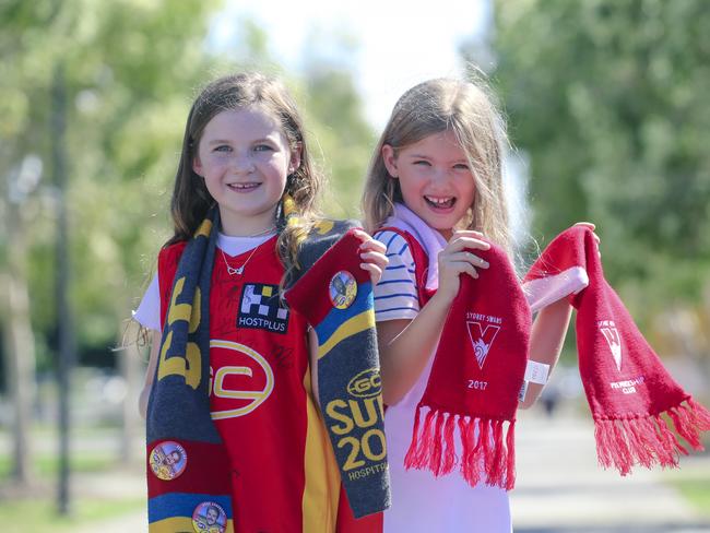 Mia Hawkins (9) and Charlotte Cziesche (8) before the Gold Coast Swans take on the Sydney Swans at People First Stadium, Carrara. Picture: Glen Campbell