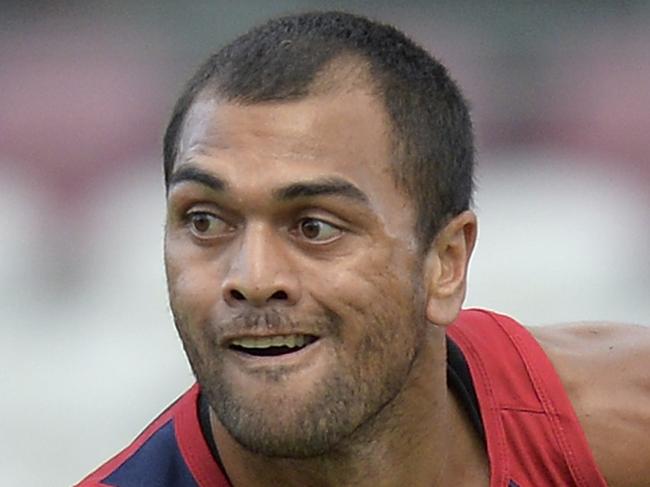 BRISBANE, AUSTRALIA - JANUARY 29: Karmichael Hunt passes the ball during a Queensland Reds Super Rugby training session on January 29, 2015 in Brisbane, Australia. (Photo by Bradley Kanaris/Getty Images)