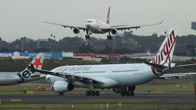 Aircraft landing at Sydney Airport. Picture: Brendon Thorne