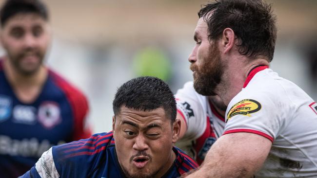 Michael Bullock (right) busy in defence for Oakdale. Picture: Julian Andrews.