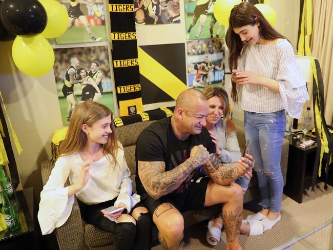 Shane Martin fist pumps while on the phone to Dustin Martin immediately after his son’s Brownlow Medal win. Picture: Alex Coppel.