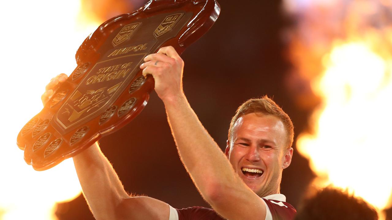 Daly Cherry-Evans lifts the Origin shield last year. Picture: Chris Hyde/Getty