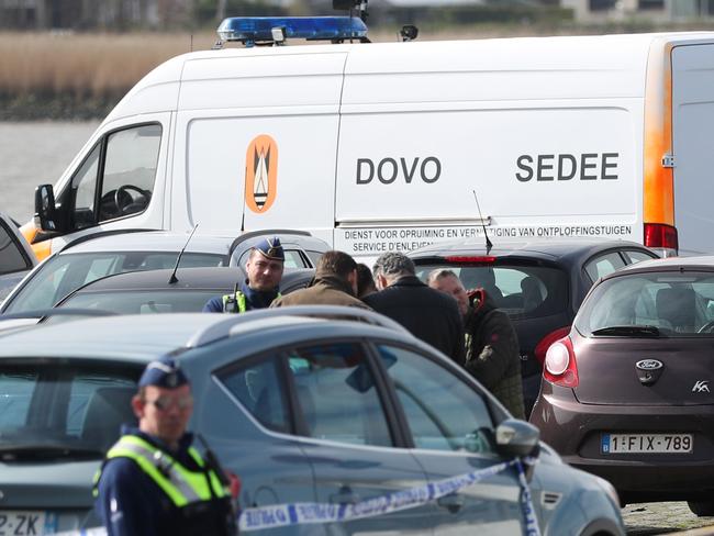 Police officers patrol in Antwerp where Belgian police arrested a man after he tried to drive into a crowd at high-speed in a shopping area. Picture: AFP/Belga/Virginie Lefour