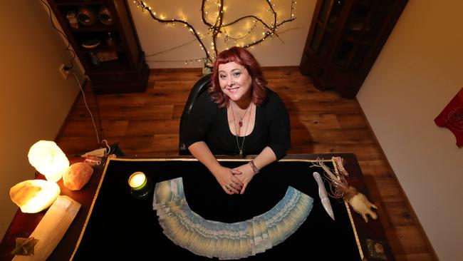 Psychic Nikki Astarya giving a reading on what she predicts for the Gold Coast at the Chameleon New Age Salon in Surfers Paradise. Picture: Glenn Hampson.