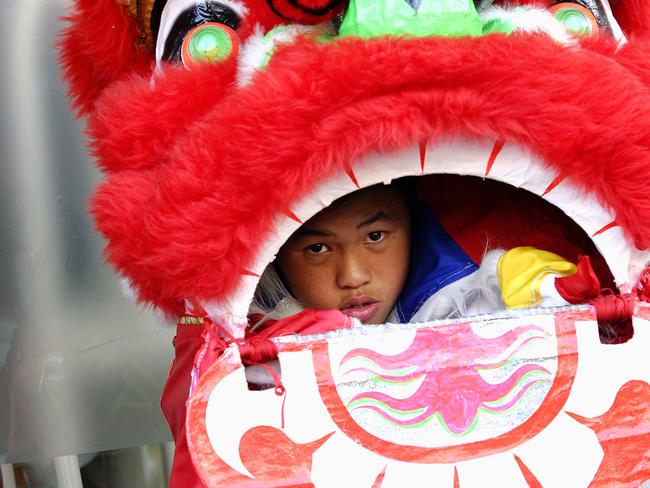 The dancing dragon takes a lunch break at the Cabramatta moon festival in 2005. Picture: James Horan