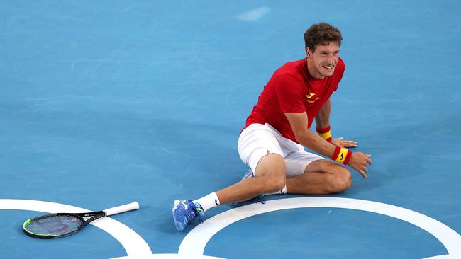 Pablo Carreno Busta in disbelief after his victory over Novak Djokovic.