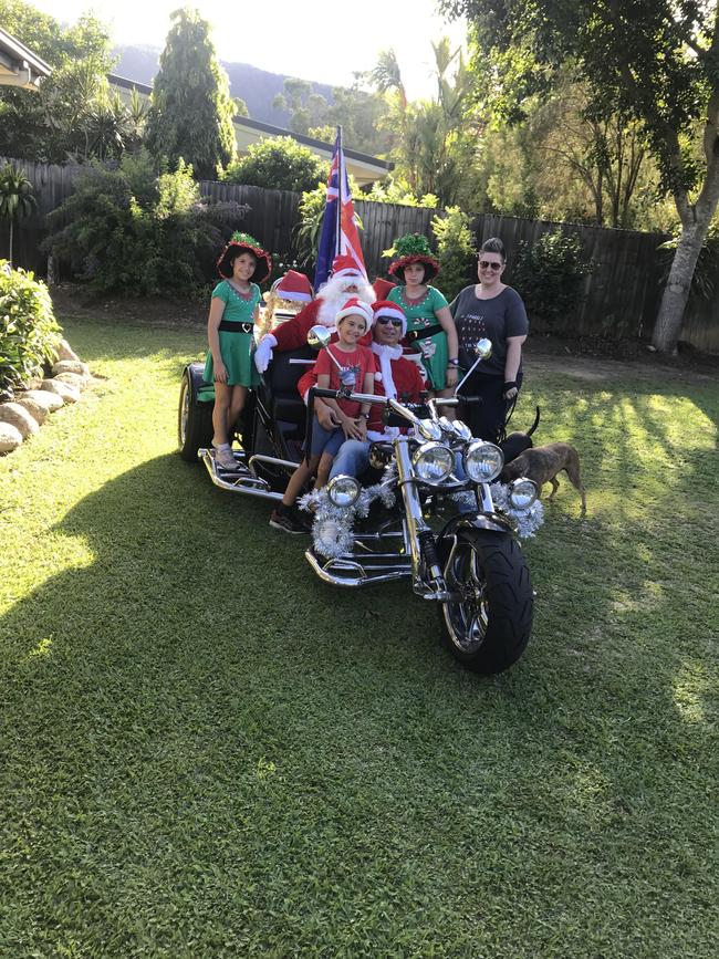 The Christmas Mustang with the whole crew ready to distribute lollies and bring some Christmas cheer. Picture: Supplied