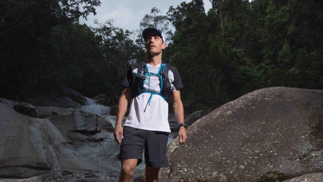 Courtney Atkinson on Mt Bartle Frere, during his week-long campaign to run up Australia's highest mountains. Picture: Wade Lewis for Red Bull