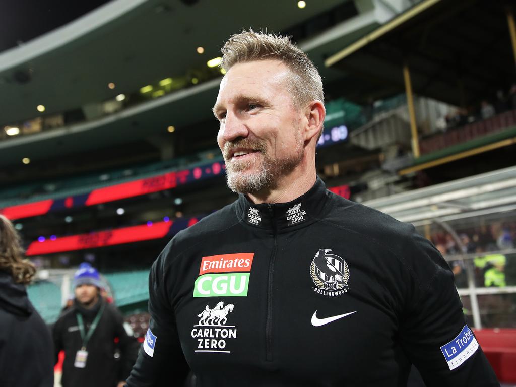 SYDNEY, AUSTRALIA – JUNE 14: Magpies head coach Nathan Buckley celebrates victory after coaching his final match for the Magpies during the round 13 AFL match between the Melbourne Demons and the Collingwood Magpies at Sydney Cricket Ground on June 14, 2021 in Sydney, Australia. (Photo by Matt King/Getty Images)