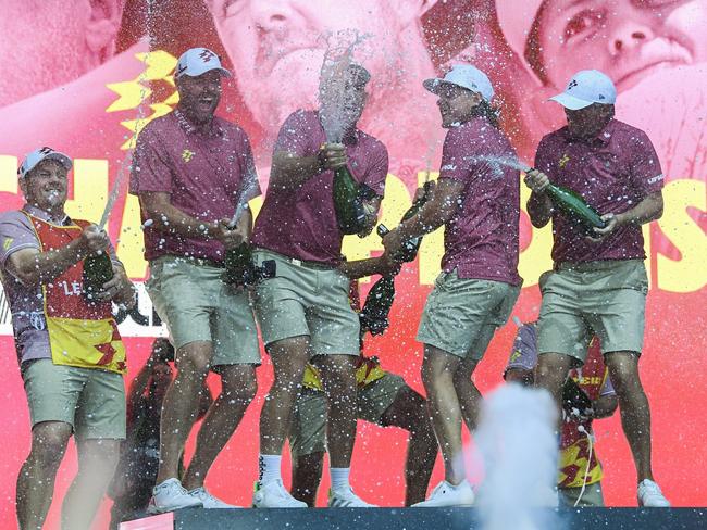 ADELAIDE, AUSTRALIA - APRIL 28:  Marc Leishman , Lucas Herbert ,Cameron Smith and  Matt Jones of the Ripper GC celebrate on stage winning the team trophy during LIV Adelaide at The Grange Golf Club on April 28, 2024 in Adelaide, Australia. (Photo by Mark Brake/Getty Images)