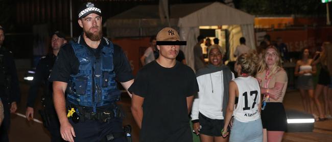 A schoolie arrested on the Gold Coast in 2017. Photo: Mike Batterham