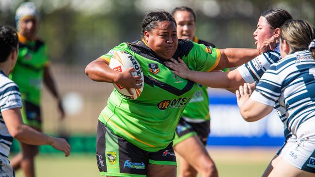 Palmerston Raiders' Lucy Aigea takes on a tackle from Darwin Brothers' Tylah Kingdon in the 2023 NRL NT semi finals. Picture: Pema Tamang Pakhrin