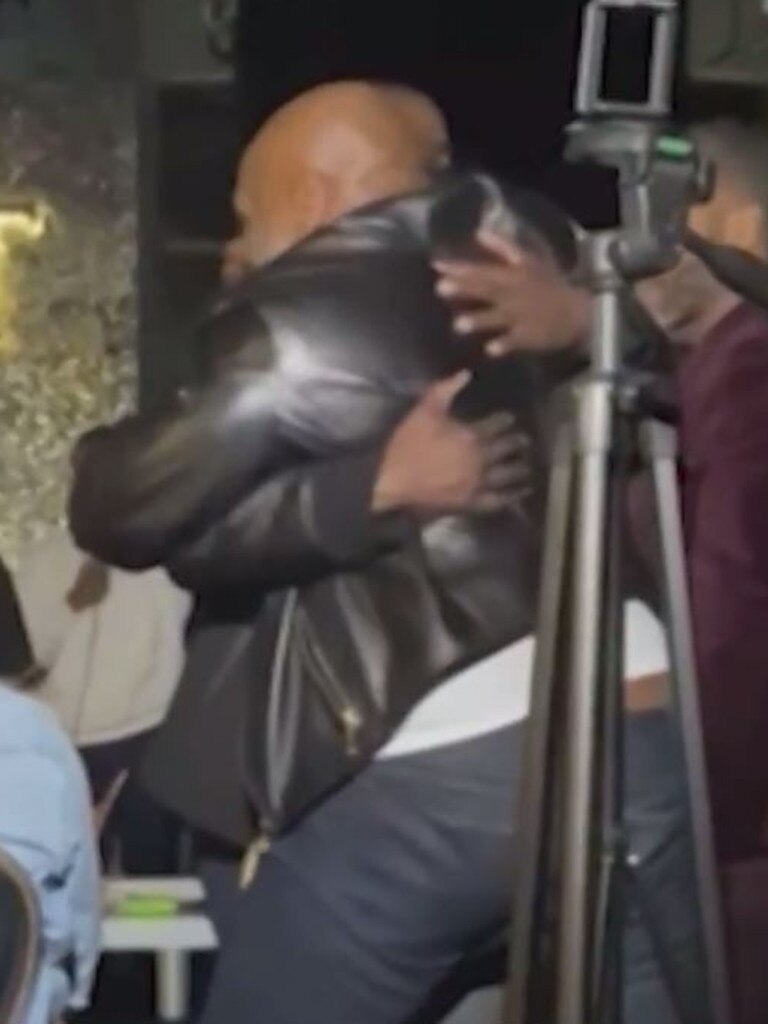 The pair shared a hug before leaving. Photo: Backgrid.