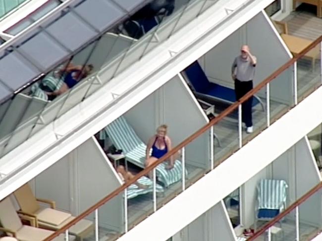 Passengers still enjoying the sun while stranded off the Victorian coast. Picture: Seven News