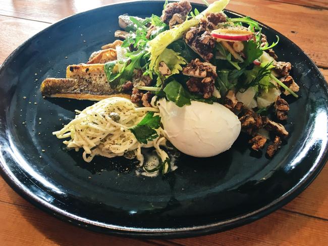 Panfried Coorong mullet with poached egg, celeriac remoulade, raisins, apple, and walnuts at New Local Eatery