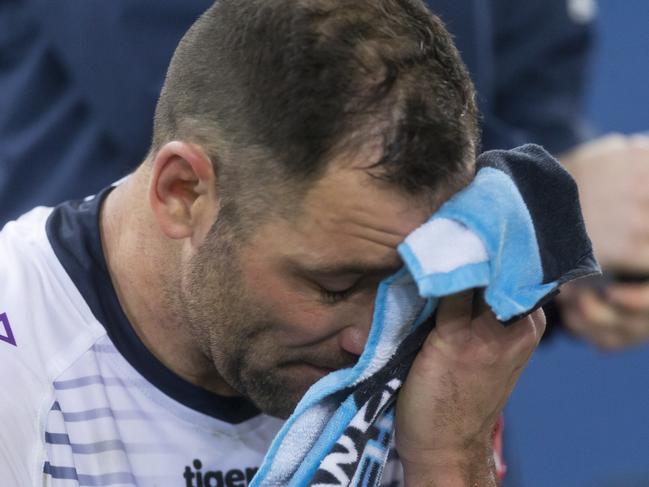 Cameron Smith of the Storm appeared injured on the bench toward the end of Round 21 NRL match between the South Sydney Rabbitohs and the Melbourne Storm at ANZ Stadium in Sydney, Friday, August 3, 2018. (AAP Image/Craig Golding) NO ARCHIVING, EDITORIAL USE ONLY