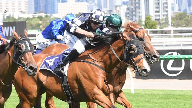 It'sourtime responds to the urgings of Billy Egan to win the Standish Handicap at Flemington. Picture: Brett Holburt/Racing Photos via Getty Images