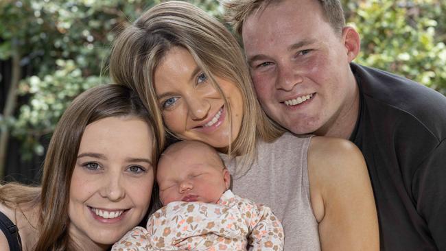 December 30, 2024: Surrogate Emily with Sarah and Tom Starkey with new baby Savannah Emily-Joan Starkey at their home. Picture: Kelly Barnes